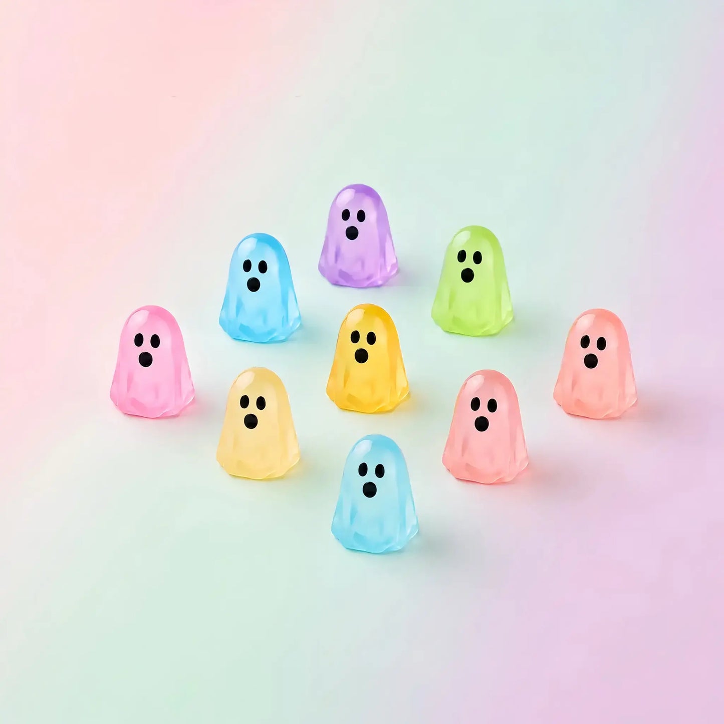 Colorful glow-in-the-dark mini ghost mystery bag figures